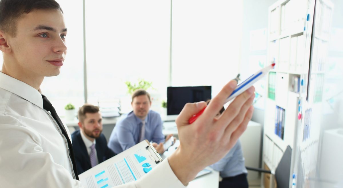 Businessman,Presentation,Coach,Draws,Plan,Writing,Plan,On,Board